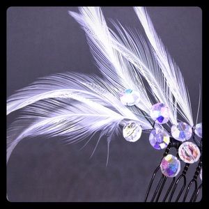 Feather bridal hair comb with iridescent beads